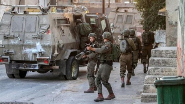 قوات الاحتلال تقتحم عدة مناطق في الضفة الغربية وتفجر مقر حركة فتح